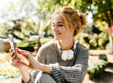 girl taking pictures on smartphone